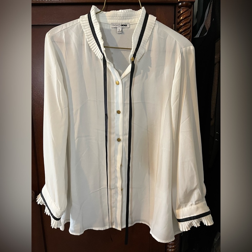 Sheer long sleeve blouse with gold button down detail